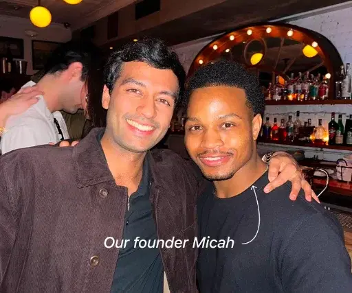 Ligo founder Micah with a friend at the bar where the idea started